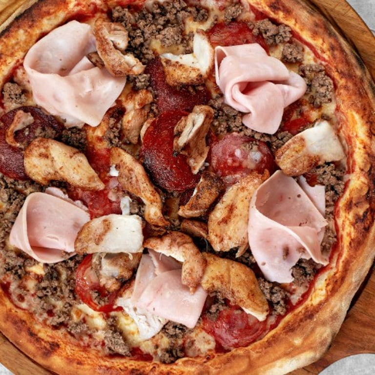 Indulge in Our Meat Pizza